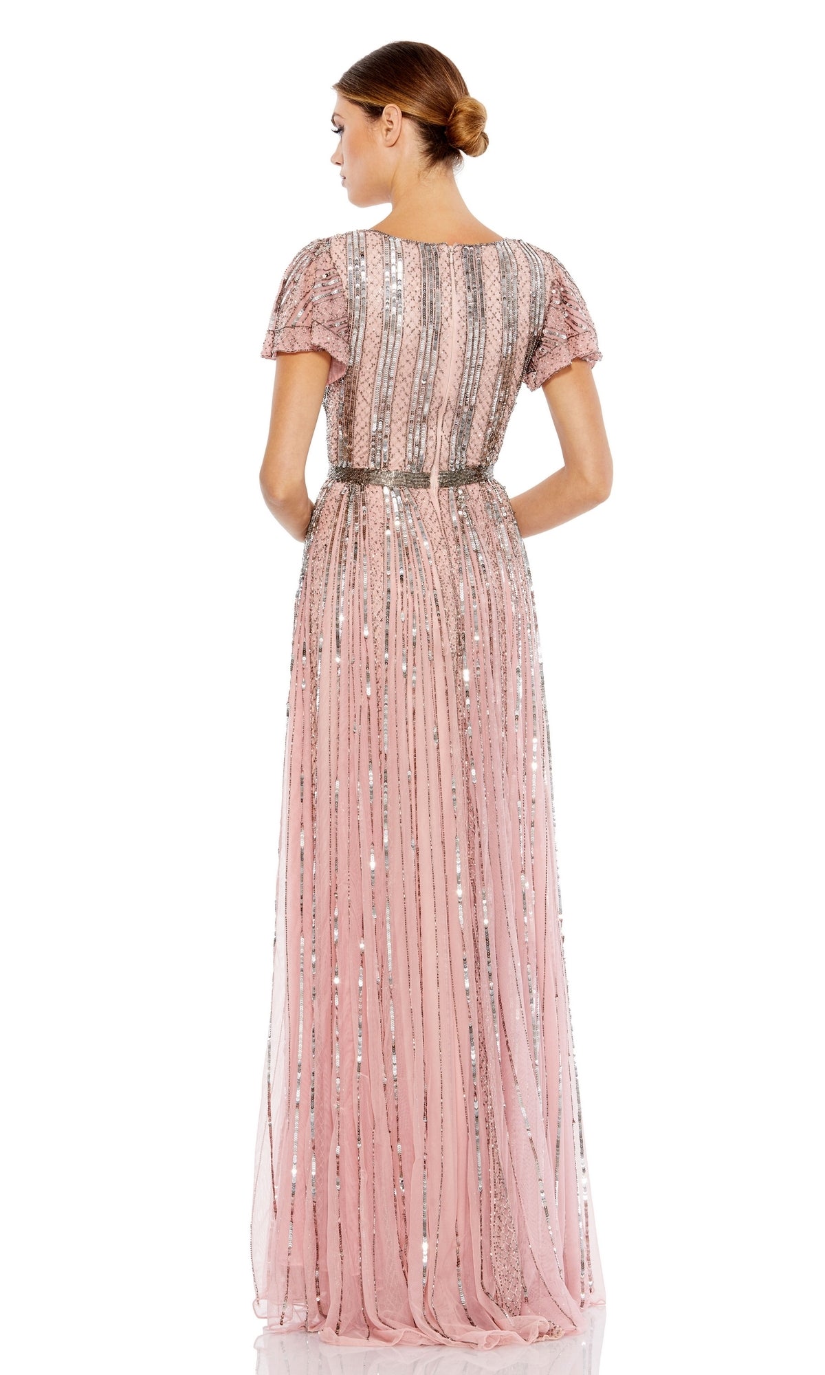 Woman wearing the Long Formal Dress 70108 by Mac Duggal, a floor-length, short-sleeved pastel gown with silver sequin stripes, standing and facing away on a white background.